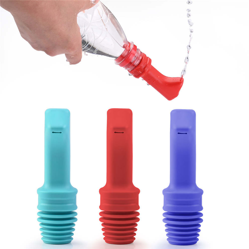 Bilden visar användning av ett munstycke i kombination med en PET flaska.